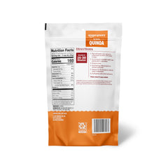 Amazon Grocery White Quinoa raw grain with measuring cup for easy dinner prep.
