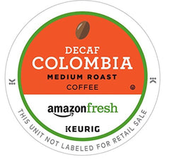 Aroma-focused close-up of AmazonFresh decaf Colombia pods for smooth coffee.