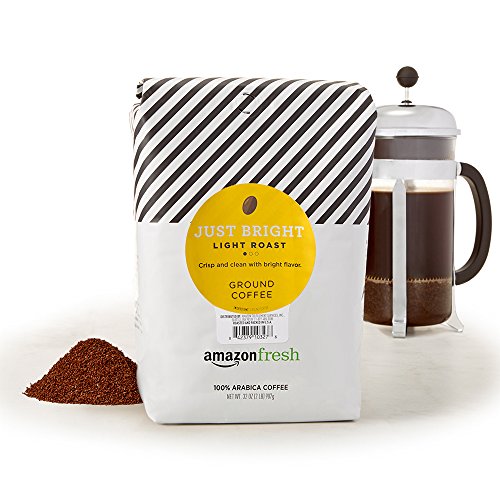 Amazon Fresh Just Bright ground coffee 32oz bag close-up of beans for a fresh aroma.