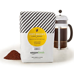 Amazon Fresh Just Bright ground coffee 32oz bag close-up of beans for a fresh aroma.