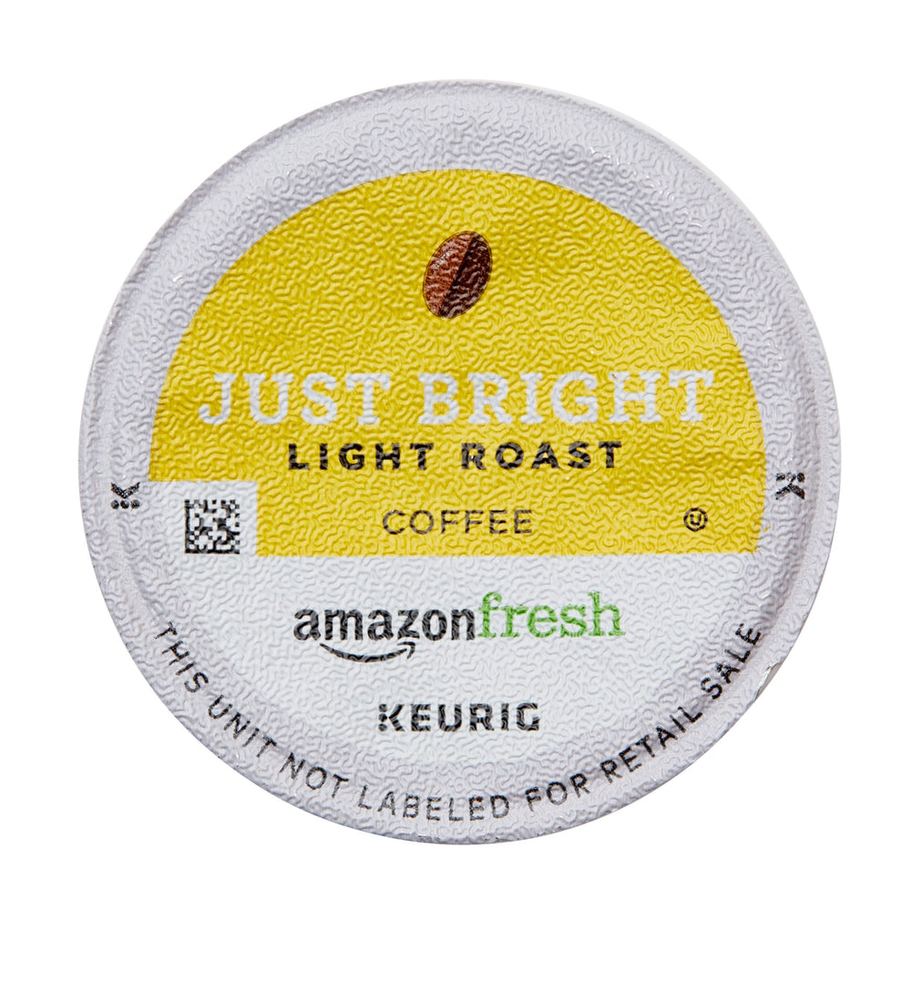 AmazonFresh Just Bright K-Cup on desk offers quick office caffeine.