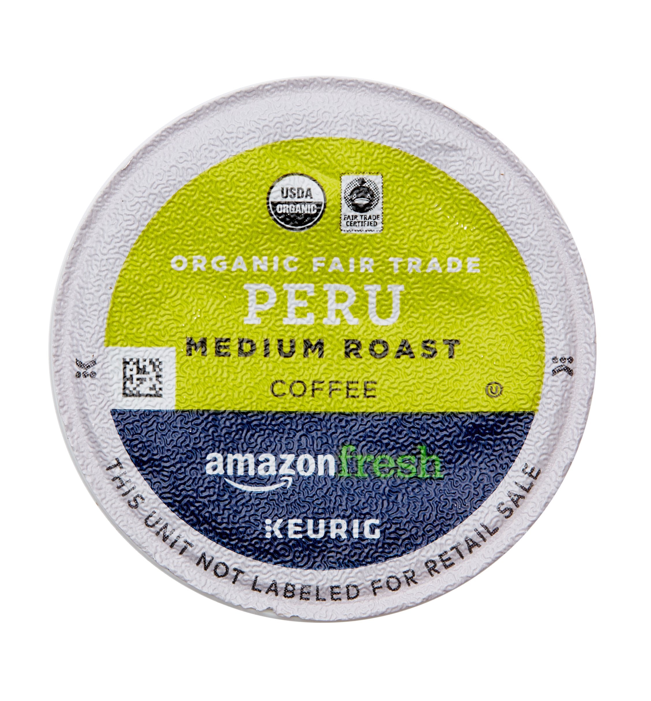 AmazonFresh organic fair trade label emphasizing ethical sourcing.