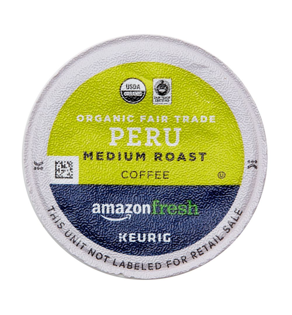 AmazonFresh organic fair trade label emphasizing ethical sourcing.