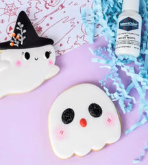 AmeriColor royal icing colored with Bright White for clean lines.