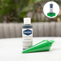 Americolor Soft Gel Paste Leaf Green frosting swirl showing consistent color.