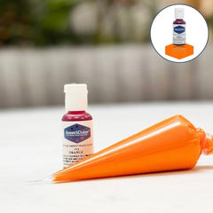 Americolor orange gel paste dispersion in bowl for quick, even shade