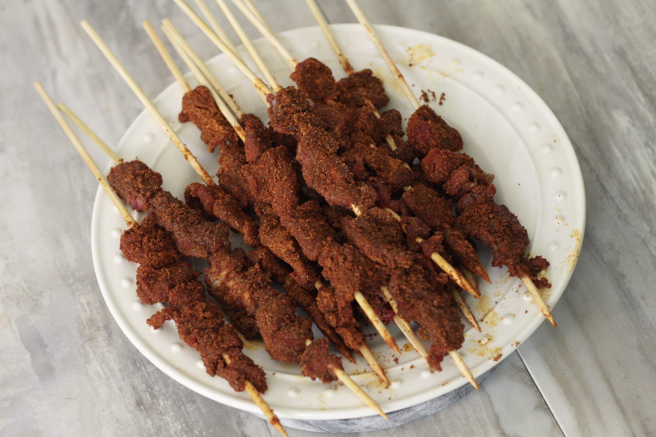 Aminchi Suya seasoning spicy powder adds depth to meat