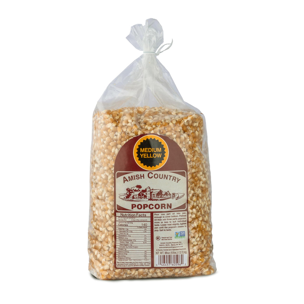 Amish Country Popcorn 6 lb bag with medium yellow kernels ready for popping.