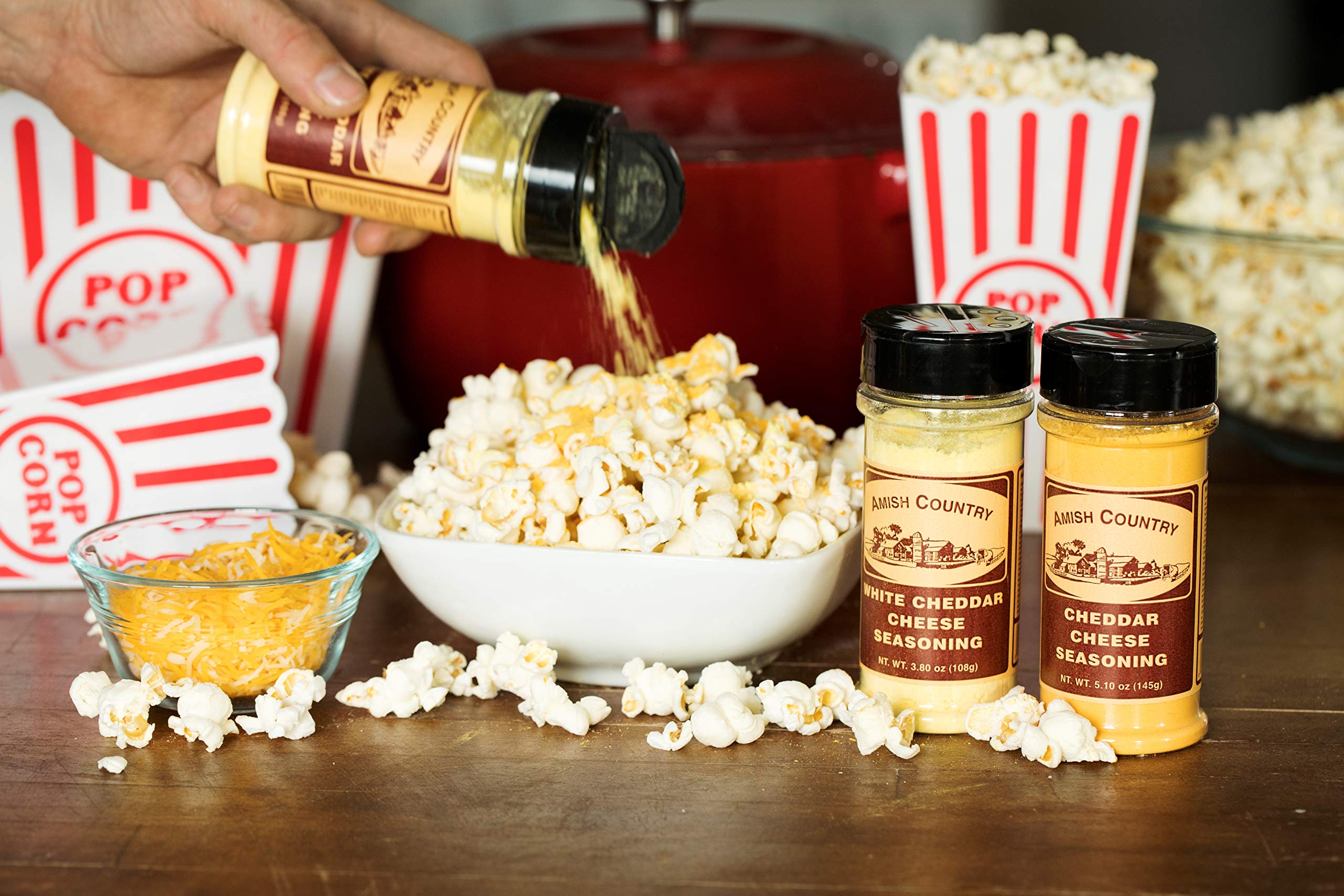 Close-up of cheddar seasoning dusting on popcorn from Amish Country Popcorn.