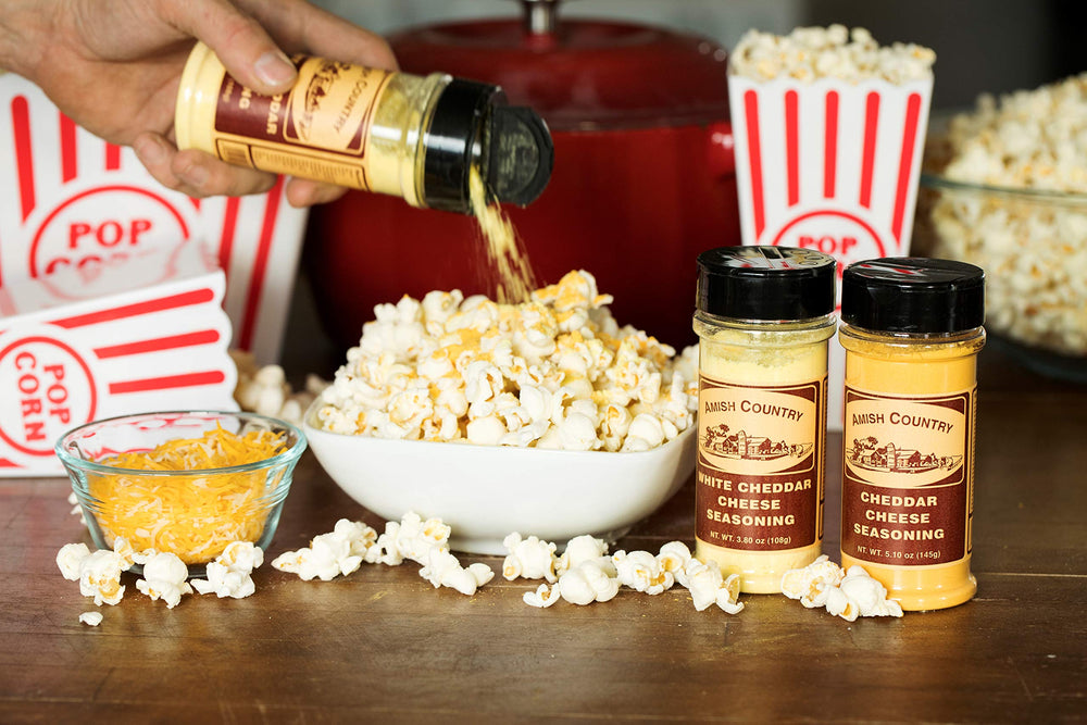 Close-up of cheddar seasoning dusting on popcorn from Amish Country Popcorn.