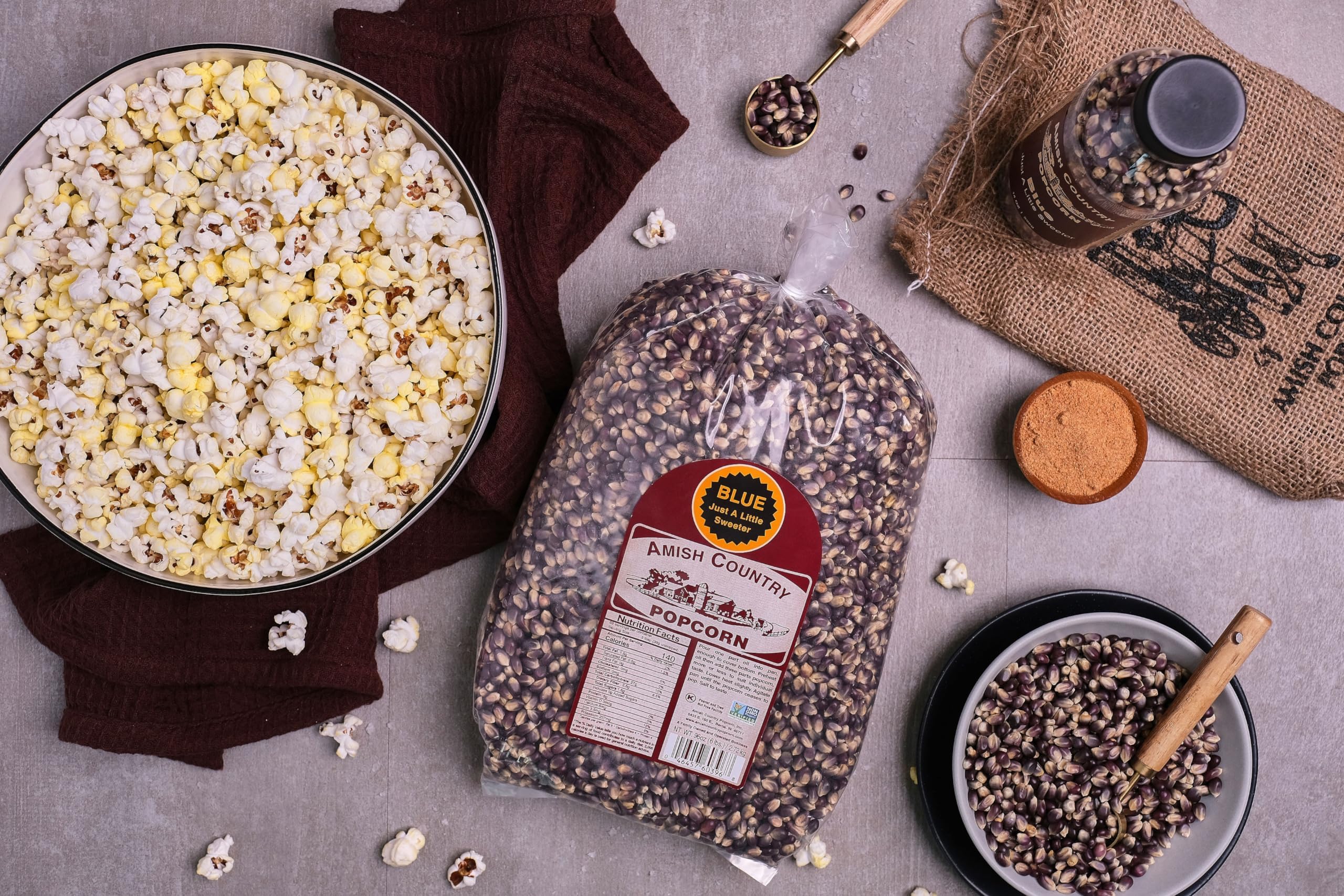 Non-GMO and gluten-free labeling on Amish Country Popcorn.