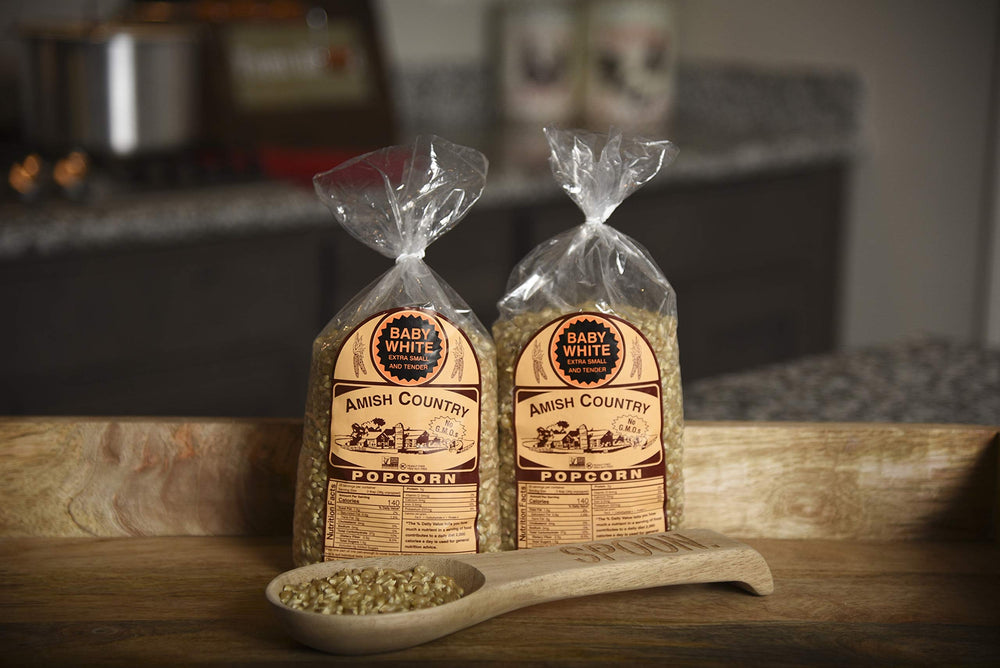 Amish Country Popcorn packaged bags on shelf highlight non-GMO gluten-free option
