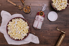 Rainbow kernels in a bowl, ideal for family movie night.