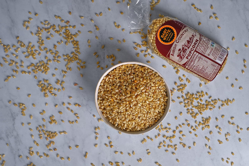 Bowl of freshly popped Amish Country Popcorn using baby white kernels.