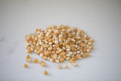 Amish Country Popcorn two-pound bags displayed for bulk snacking