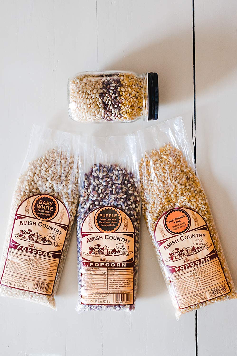 Amish Country Popcorn variety pack front view with three kernels.