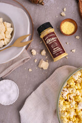 Amish Country Popcorn White Cheddar Seasoning dusting on popcorn provides even coverage