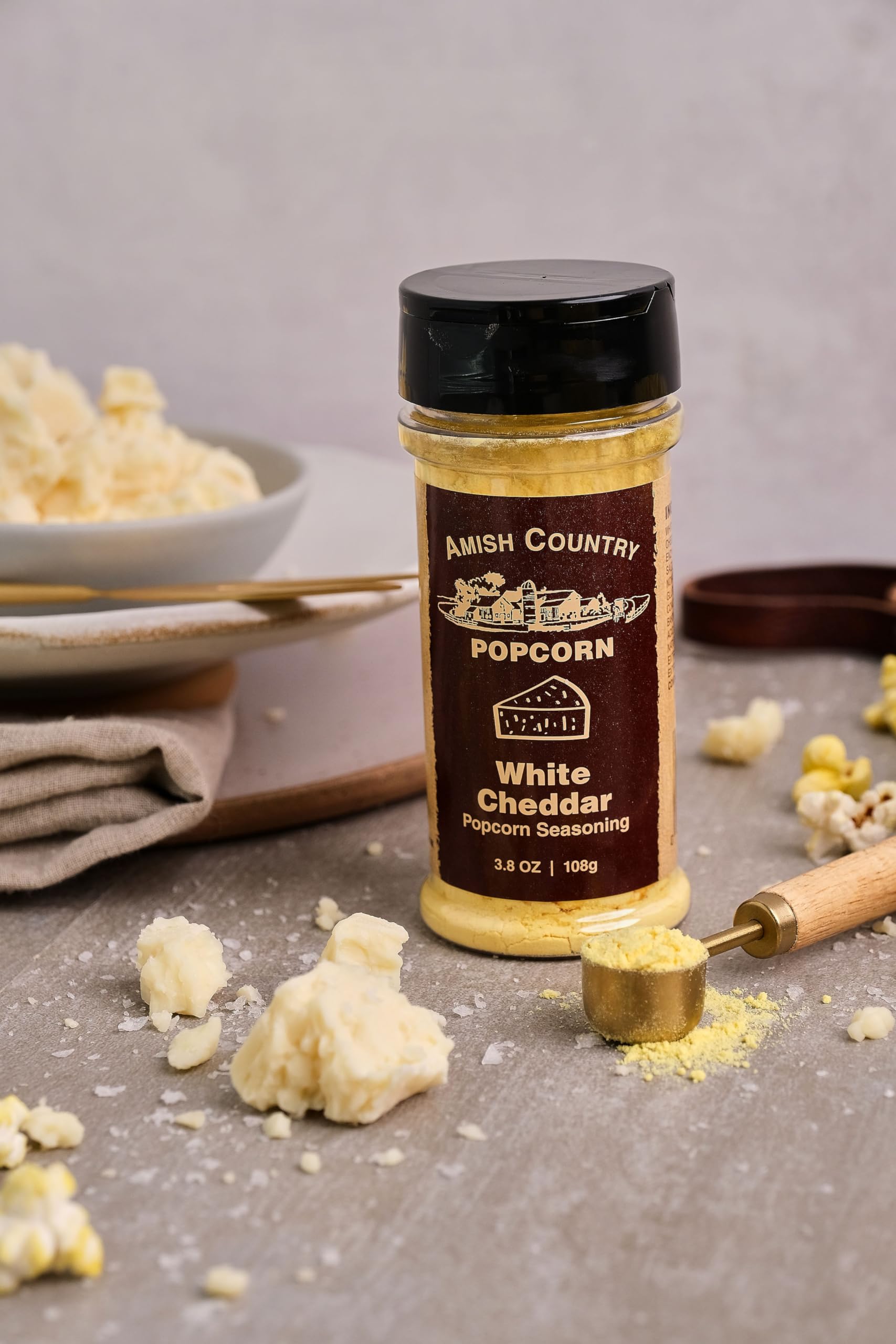 Amish Country Popcorn White Cheddar Seasoning label closeup highlights non-GMO ingredients