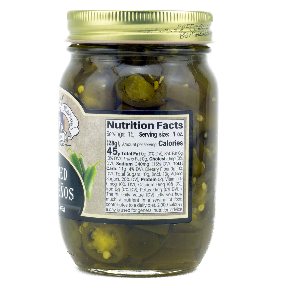 Two jars of Amish Wedding Candied Jalapenos, ideal for gifting or pantry.