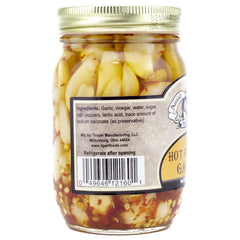 Amish Wedding hot-pickled garlic on a serving board for bold bites.