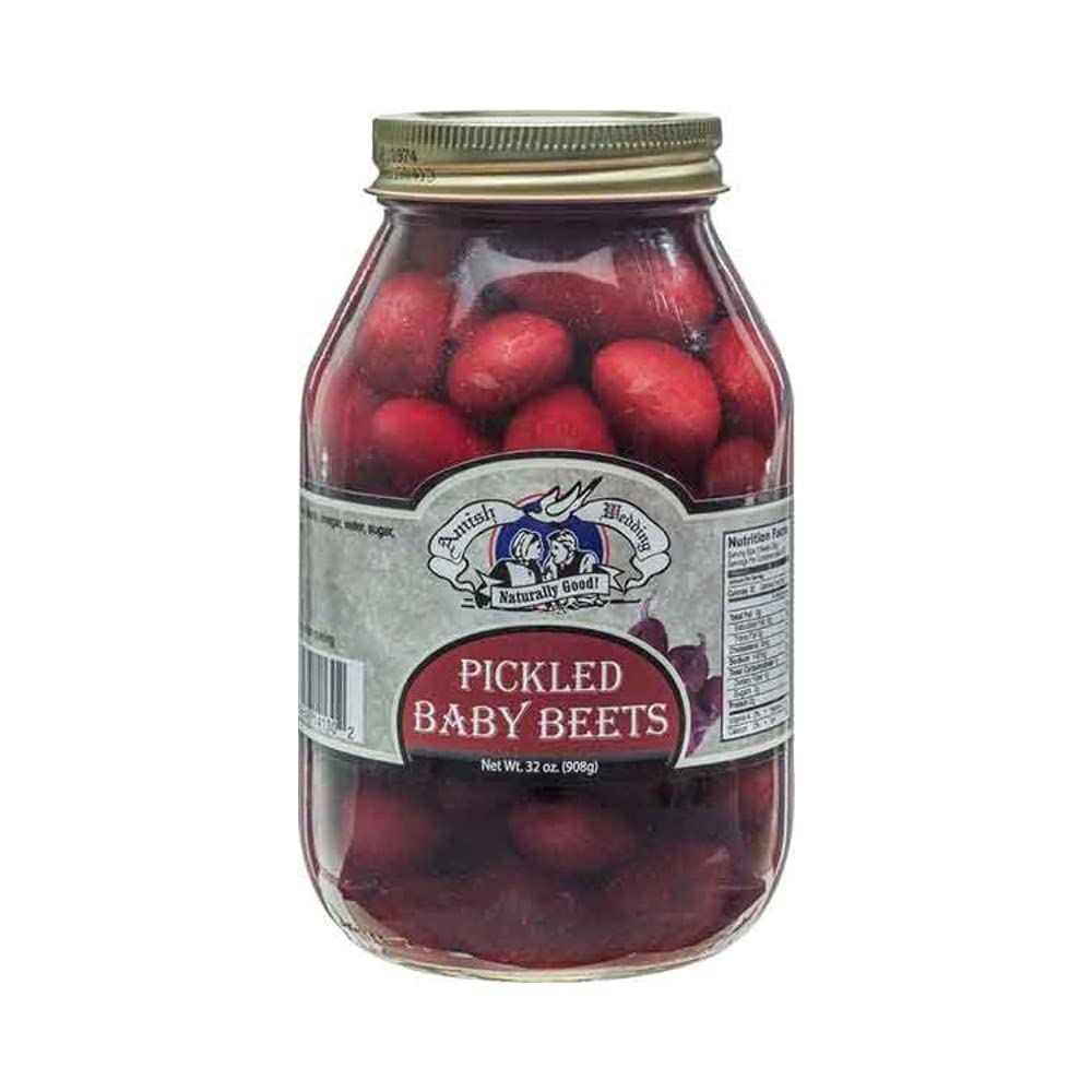 Amish Wedding Pickled Baby Beets in a glass jar ready to serve as a colorful side.