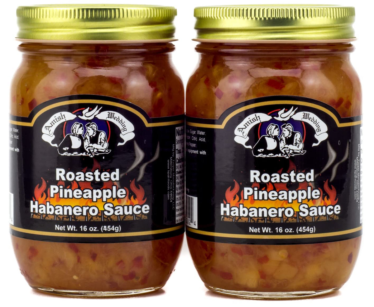 Amish Wedding Roasted Pineapple Habanero Sauce label showcases bold flavor.