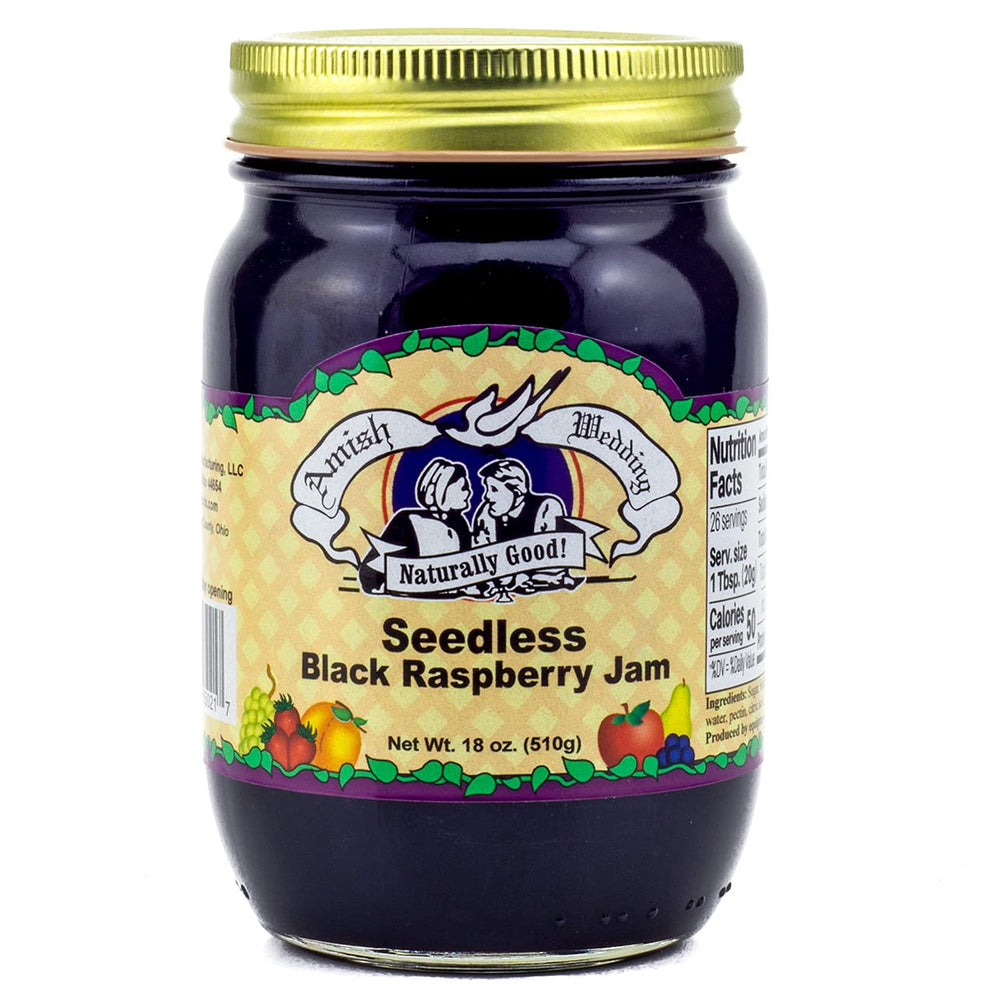 Toast topped with Amish Wedding seedless black raspberry jam for a glossy berry spread.
