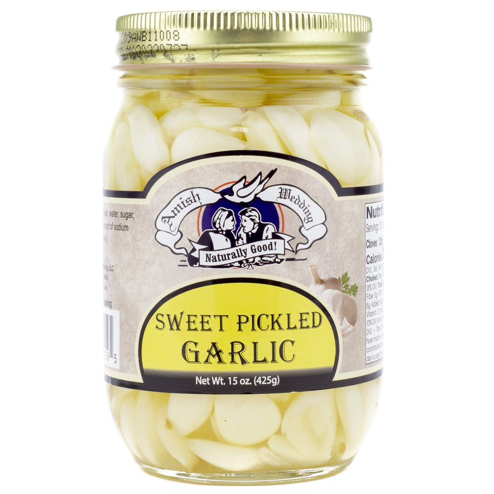 Amish Wedding sweet pickled garlic served on charcuterie board for flavorful bites.