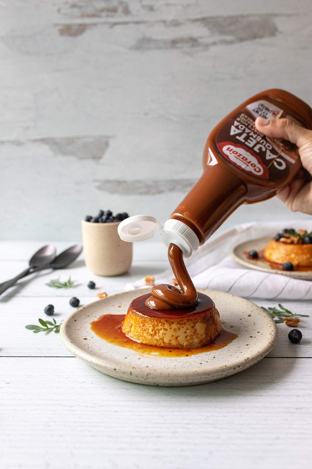 Ingredient list highlights goat milk and dulce leche for a creamy base.