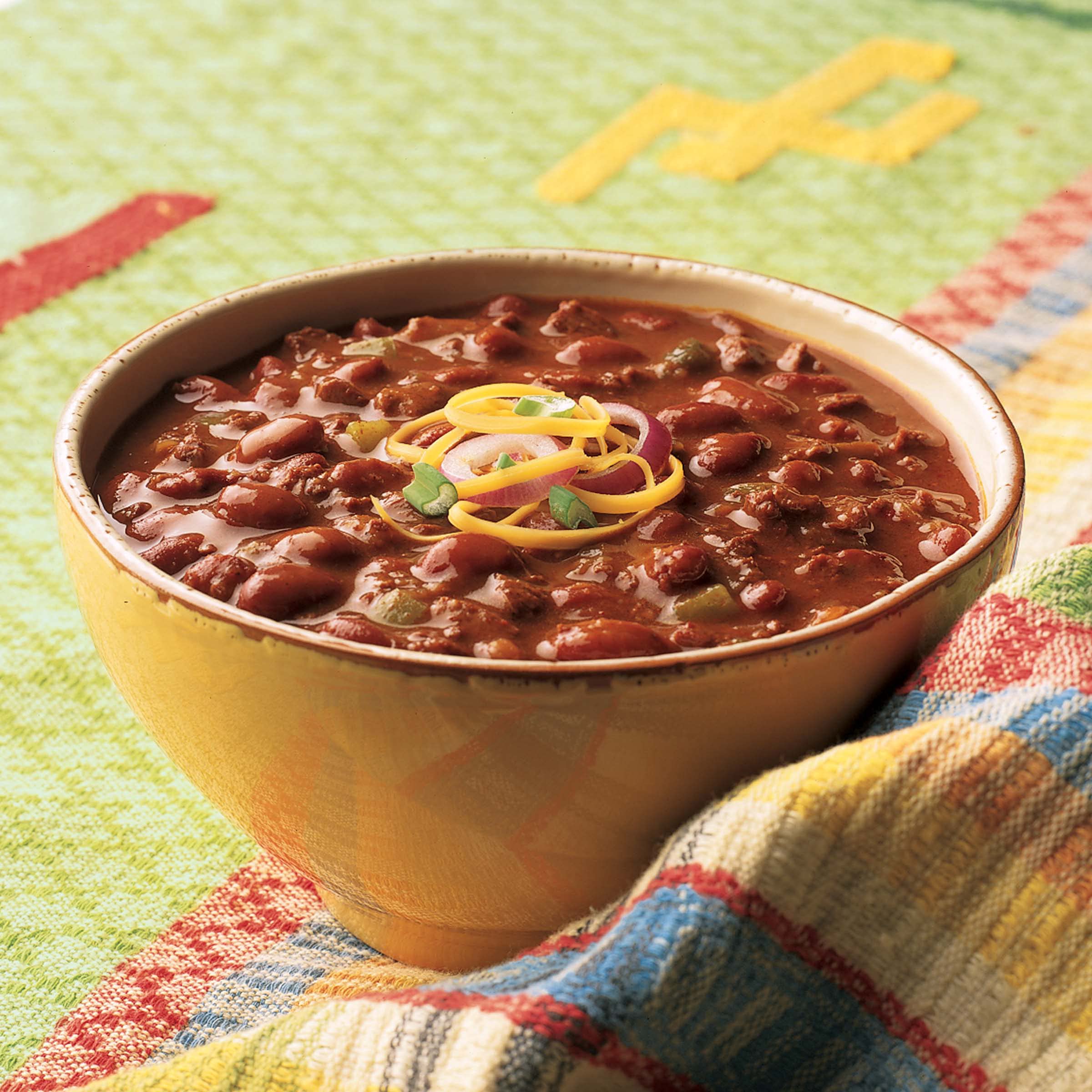 Amy's Chilis can packaging emphasizing BPA-free cans and organic ingredients