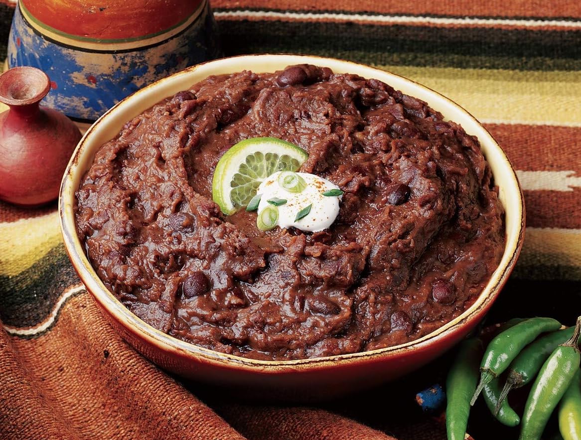 Amy's microwave-ready refried beans in bowl; quick heat for meals.