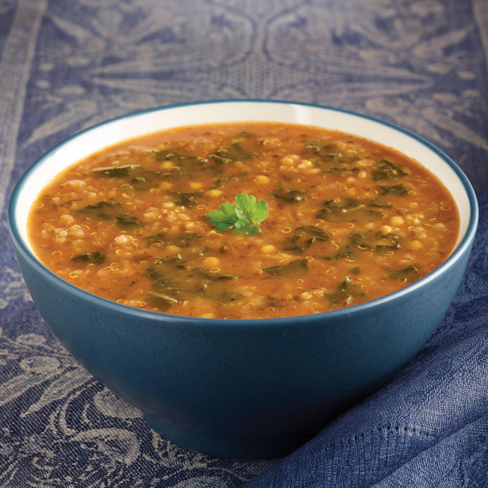 Serving bowl of Amy's Kale Quinoa Red Lentil Soup ready to eat.