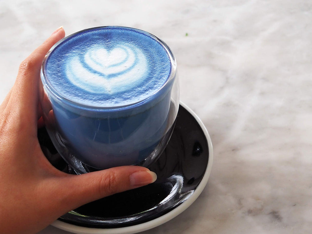 Ancient Choice butterfly pea powder blends into smoothies for colorful nutrition.