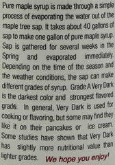 Anderson's Maple Syrup Very Dark kitchen scene with pancakes and pourable syrup