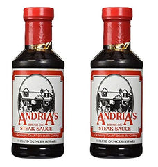 Andria's Steak Sauce bottle pour enhances grilled steaks with bold, savory flavor.