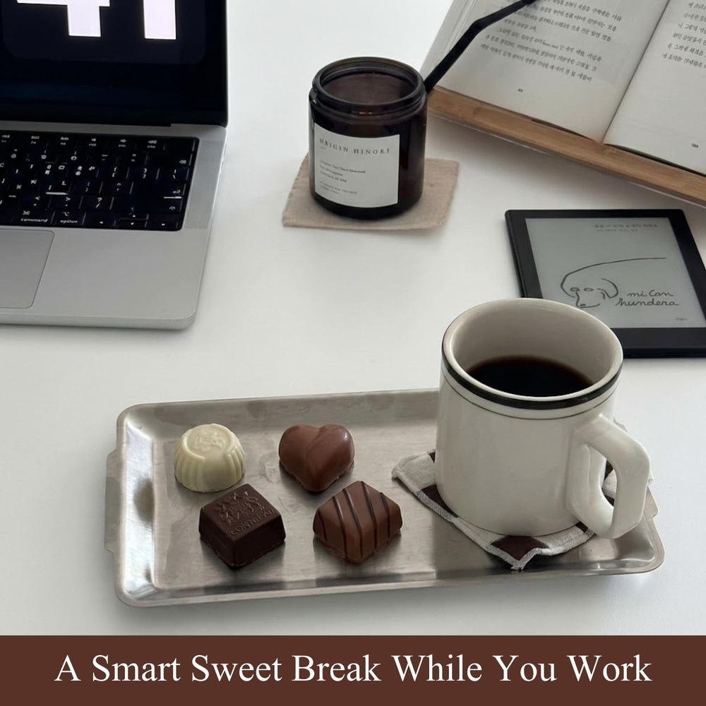 Andy Anand Chocolatier elegant gift packaging with truffles for celebrations.
