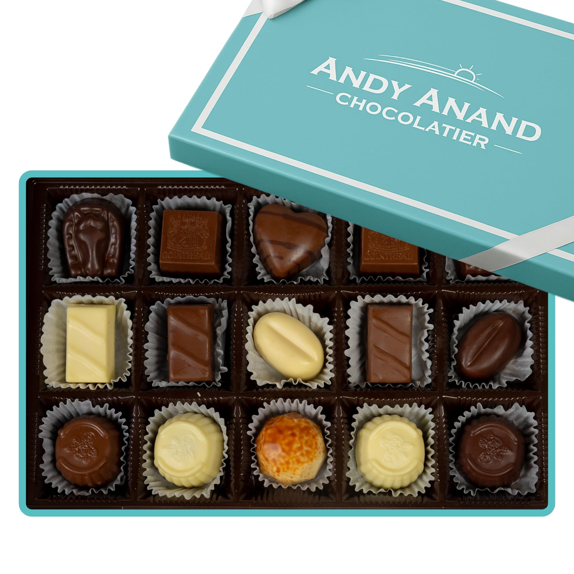 Andy Anand Chocolatier plated truffles on wooden board for tasting session.