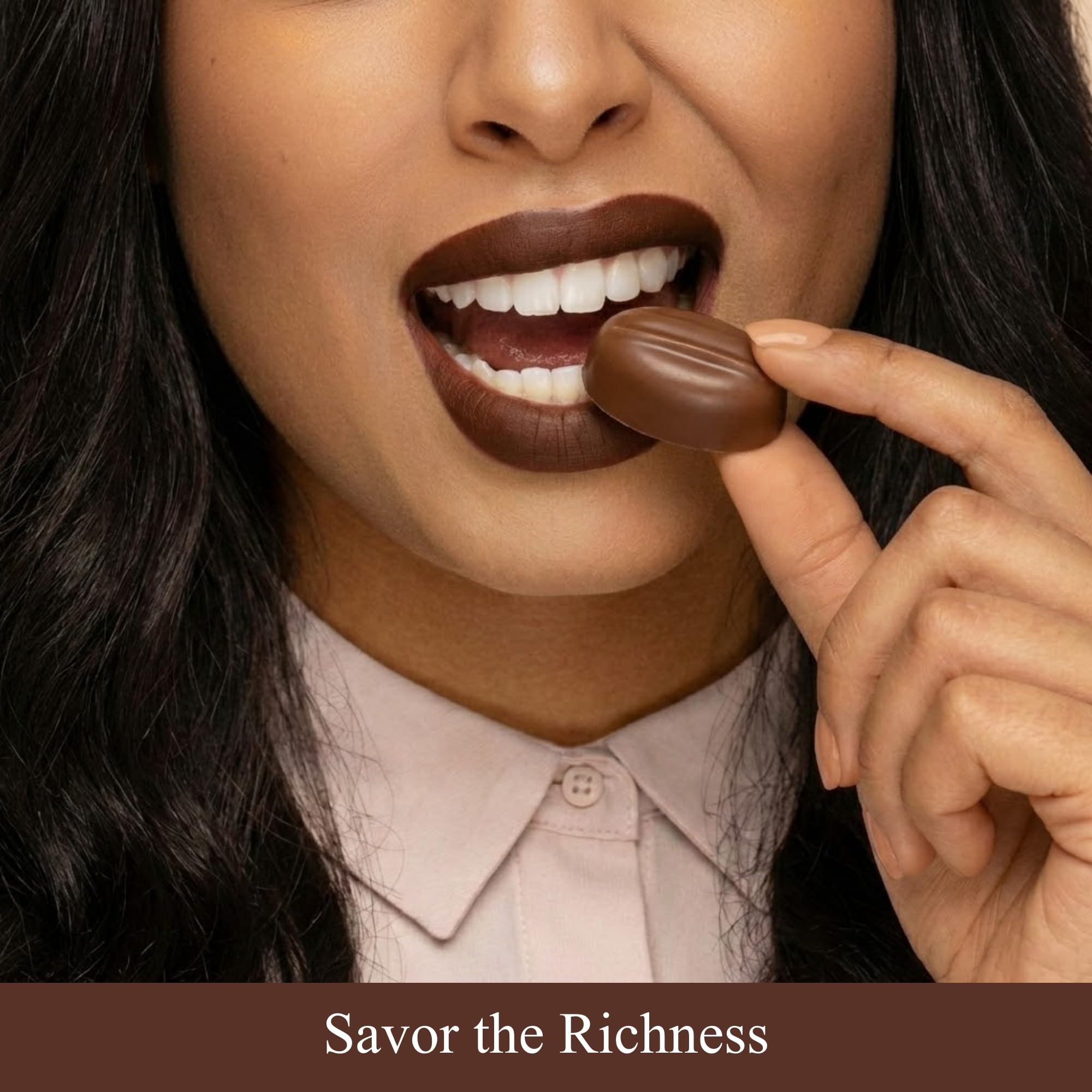 Andy Anand Chocolatier smooth velvet truffle texture closeup suggests luxury.