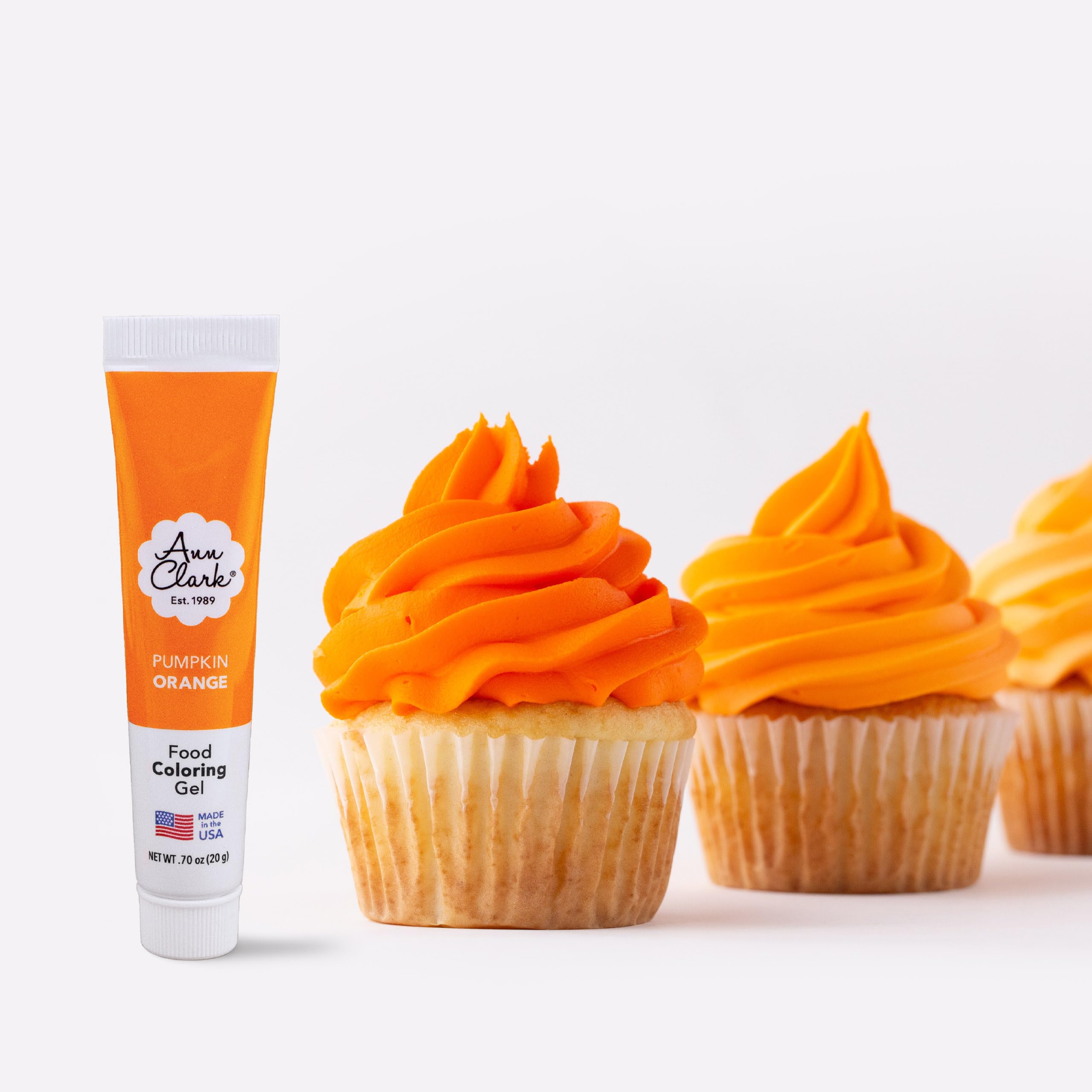 Ann Clark pumpkin orange gel color bottle close-up for vibrant icing.