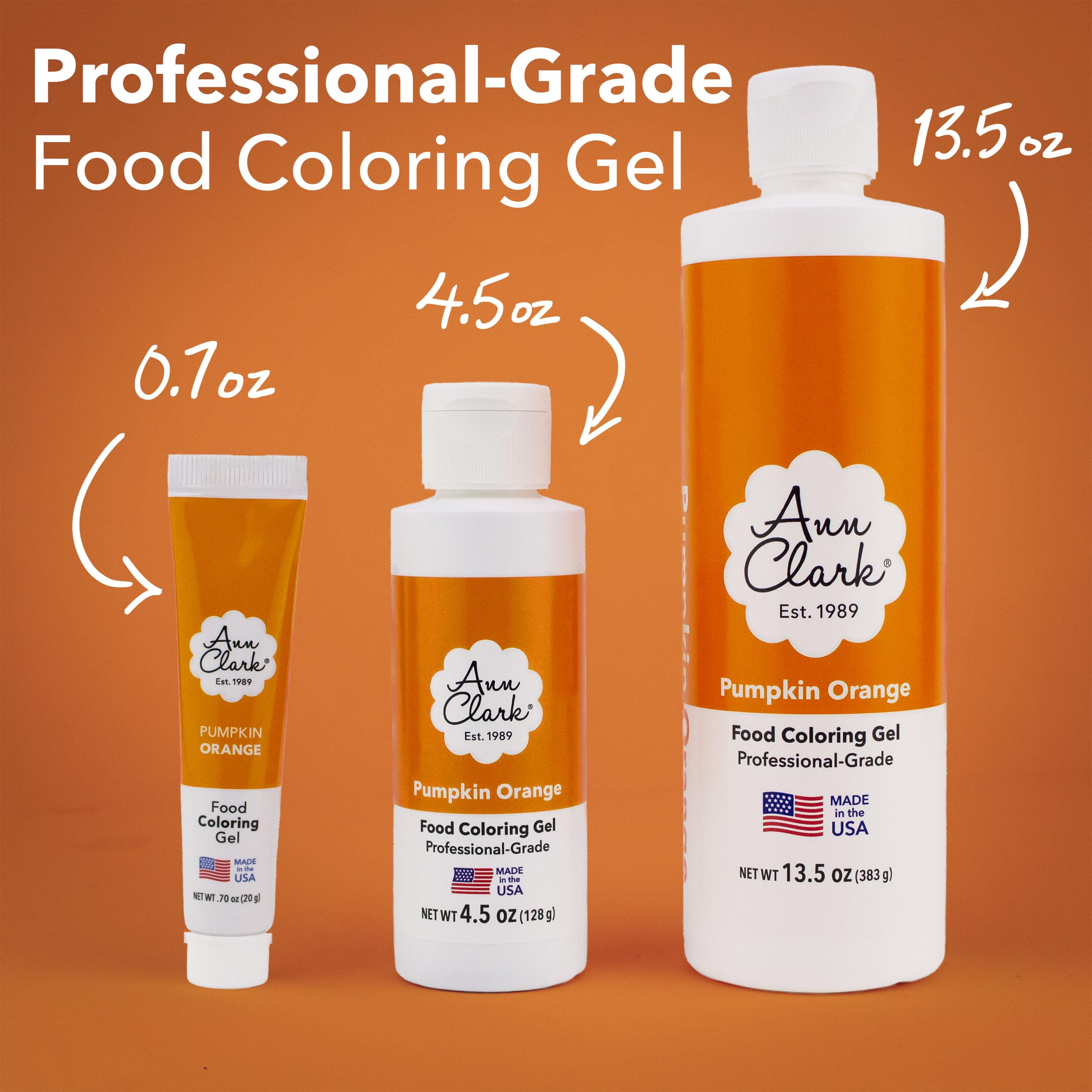Ann Clark pumpkin orange gel applied to frosting for even color.