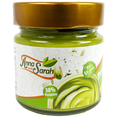Anna and Sarah pistachio butter cream jar showing premium pistachios and cream texture.