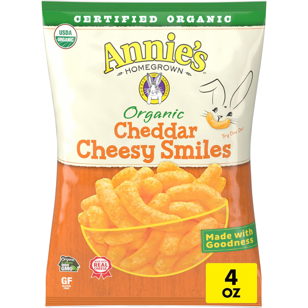 Annie's Cheddar Cheesy Smiles puffs in a pack, gluten-free snack option