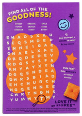 Child enjoying Annie's Organic Cheddar Squares as an after-school snack