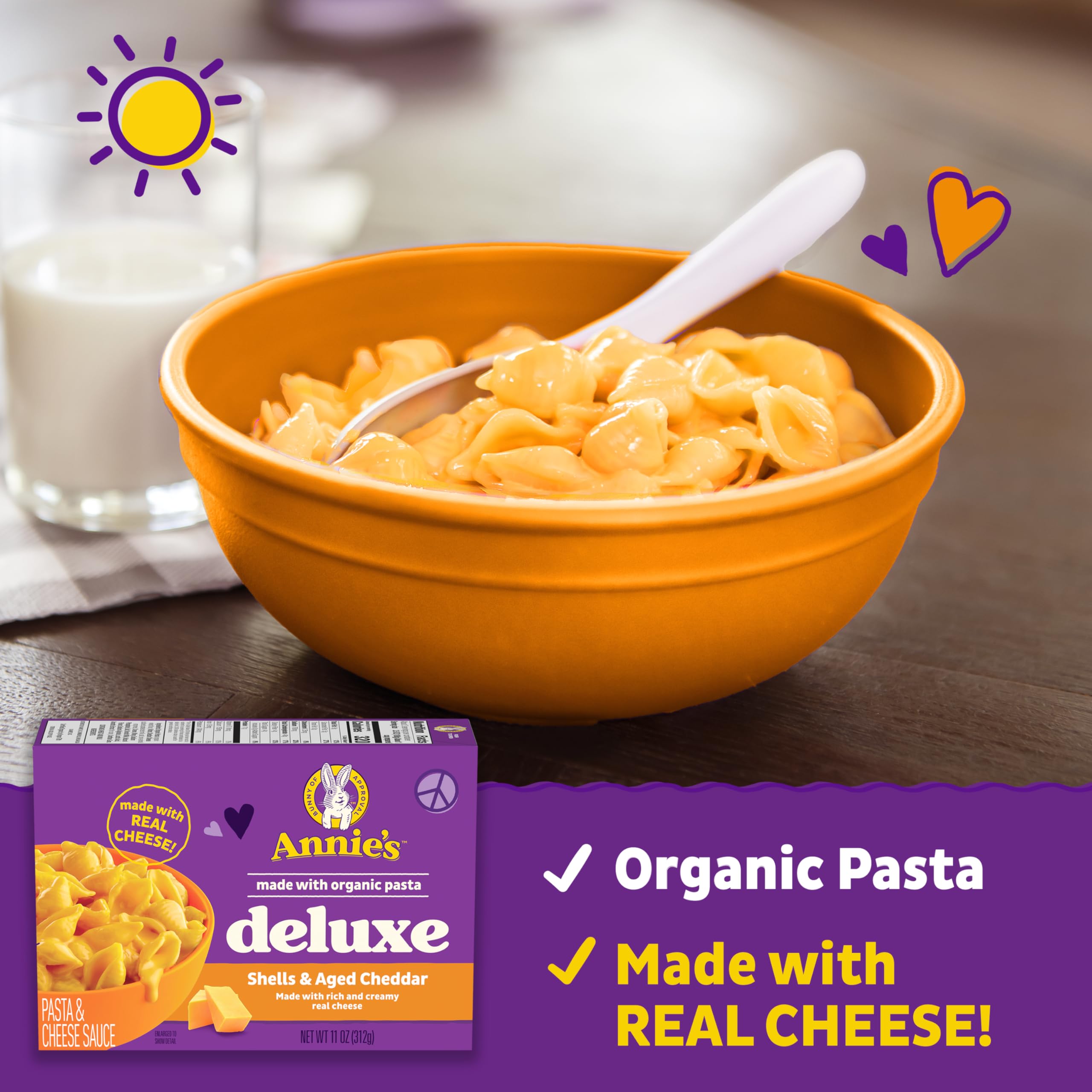Annie's Deluxe Shells and Aged Cheddar simmering pasta in pot with creamy sauce