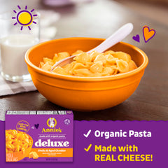 Annie's Deluxe Shells and Aged Cheddar simmering pasta in pot with creamy sauce