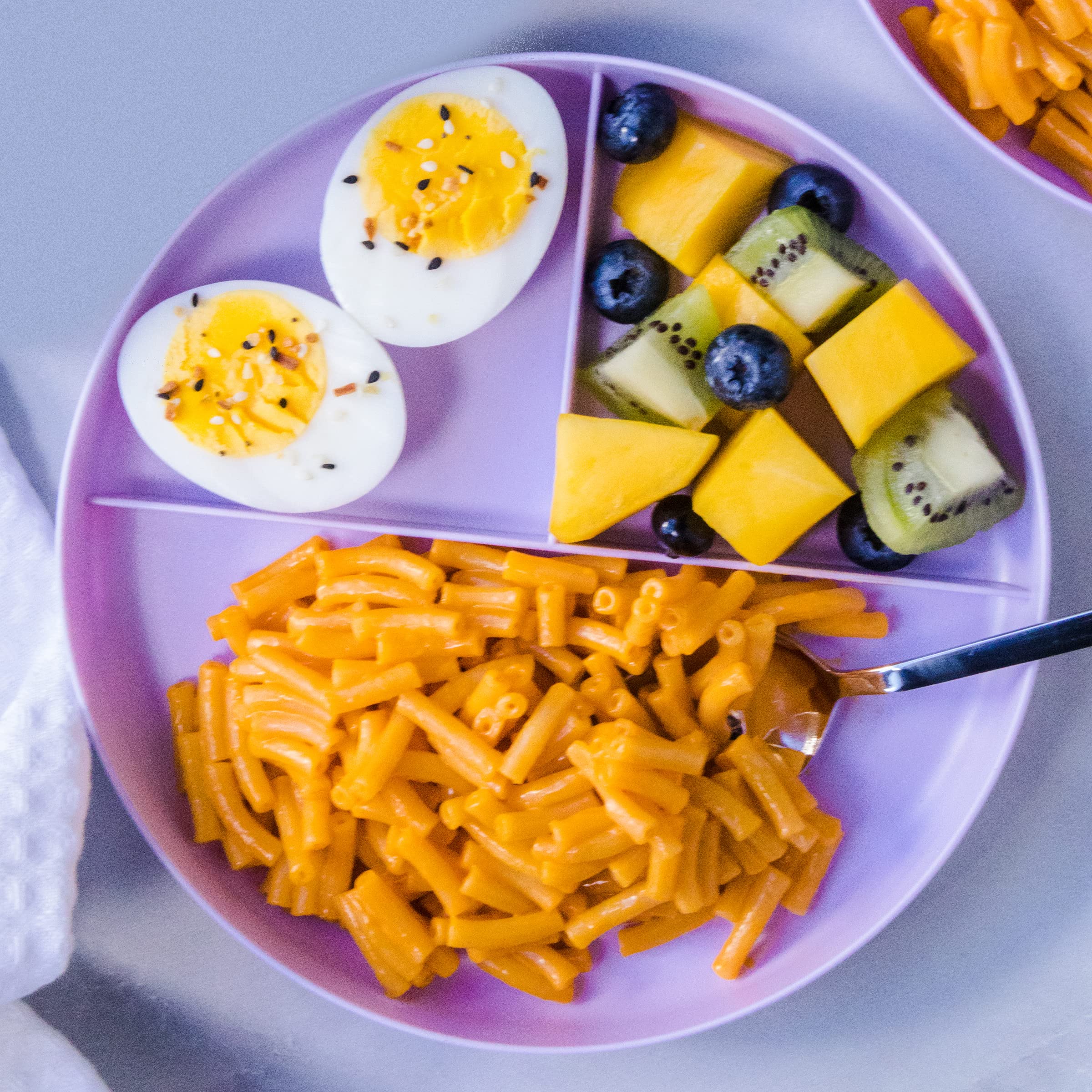 Family dinner serving bowl of Annie's macaroni for sharing.