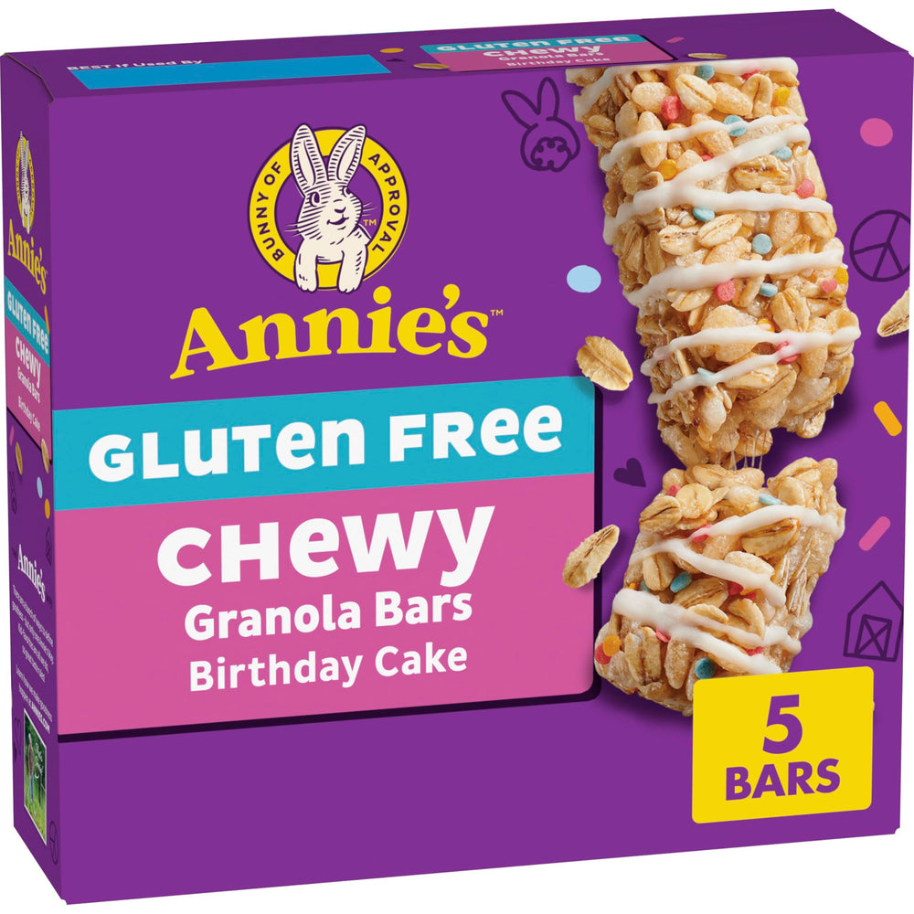 Annie's Gluten Free Chewy Granola Bars Birthday Cake packaging on a counter, ideal for lunchboxes.
