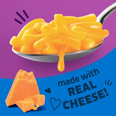 Annie's Organic Grass-Fed Macaroni cheddar cheese packet for creamy real-cheddar melt.