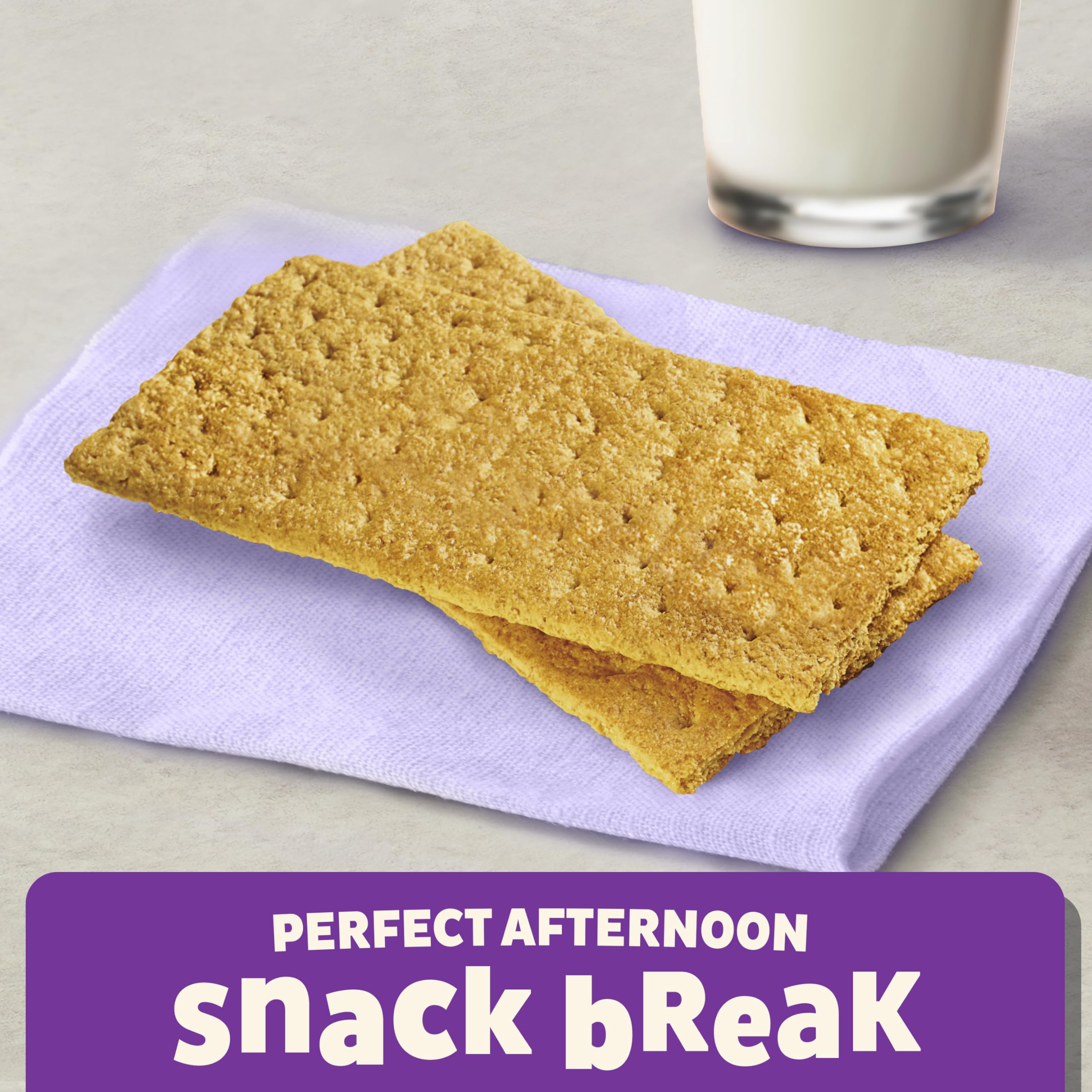 Annie's Honey Graham Crackers paired with nut butter for a tasty, energy-boosting bite.
