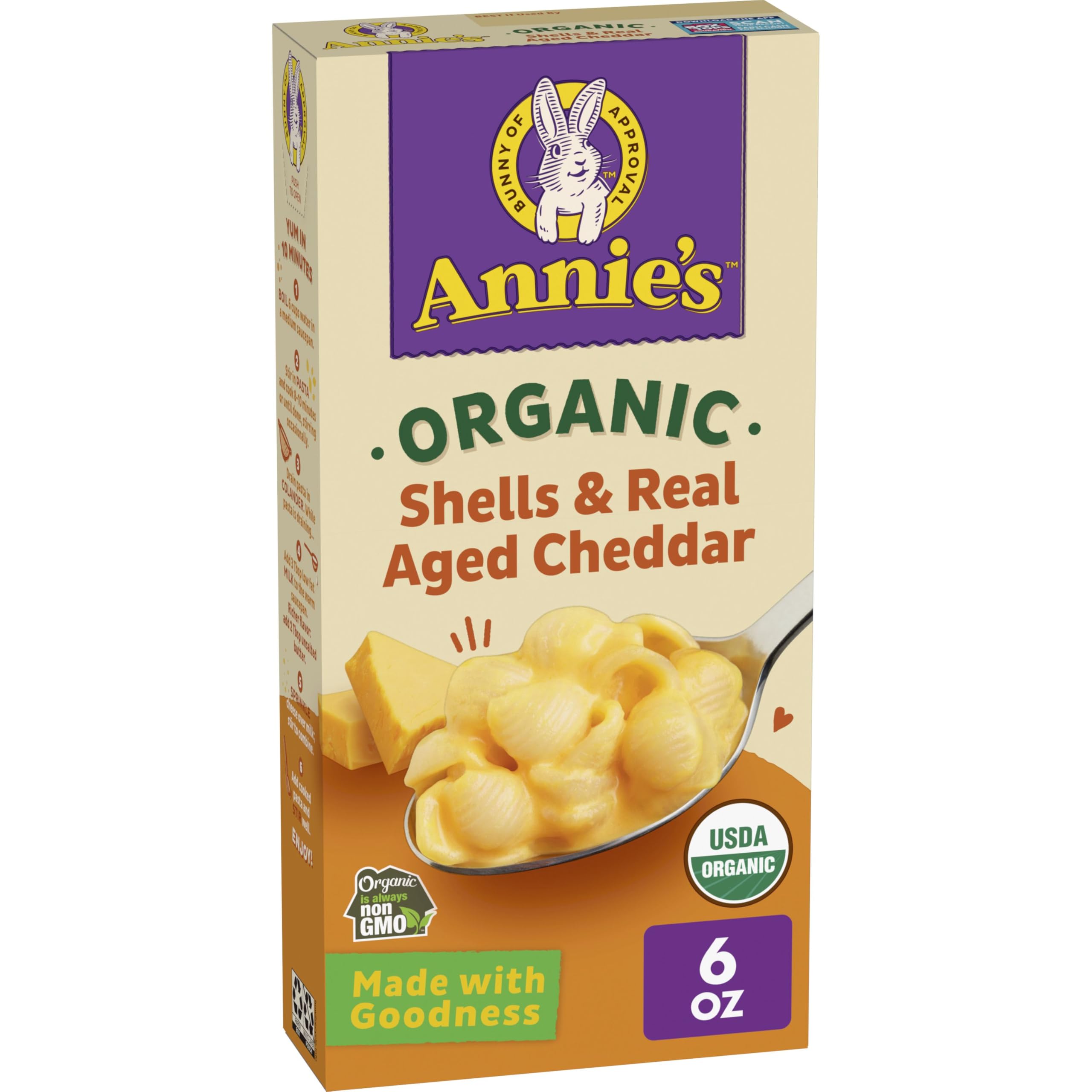 Annie's Organic Shells with Real Aged Cheddar in a creamy bowl for family dinner.